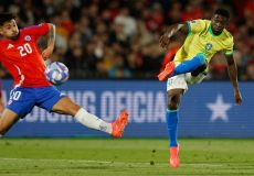 Brazil's forward Luiz Henrique (R) shoots and scores his team's second goal during the 2026 FIFA World Cup South American qualifying  football match between Chile and Brazil, at the National stadium in Santiago, on Thursday. (AFP)